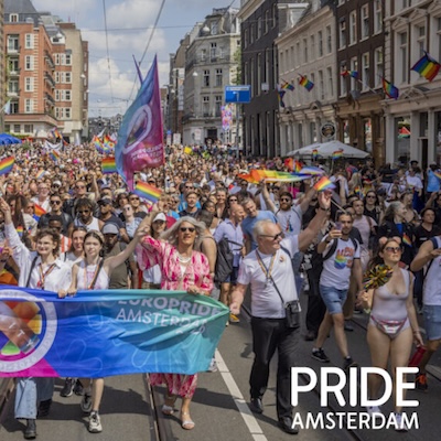 Pride Amsterdam march with a WorldPride banner and crowds