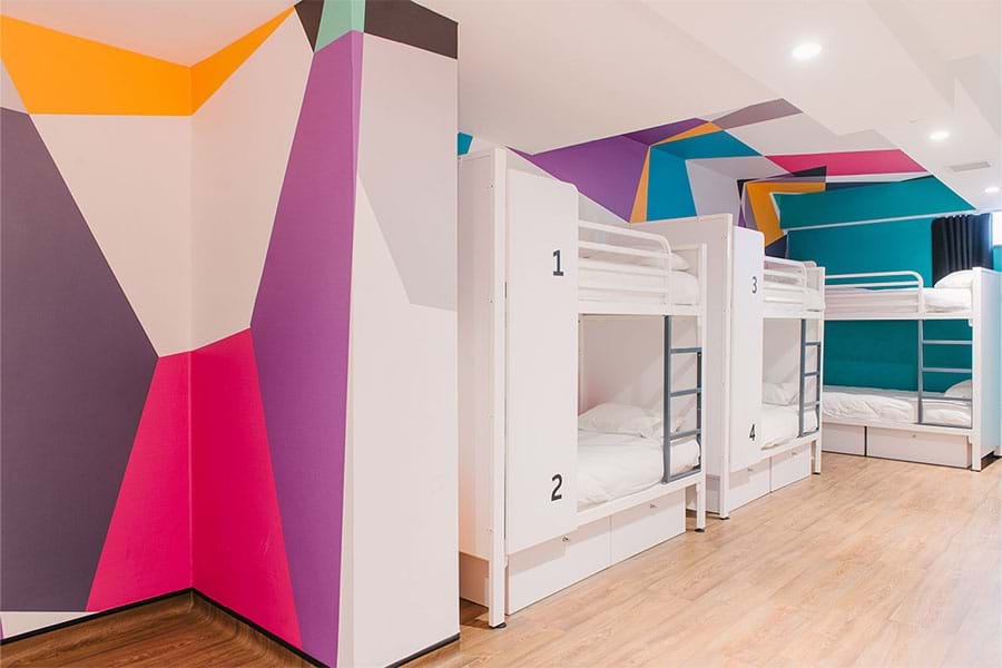 Bed in 6-bed Dorm – Shared Bathrooms